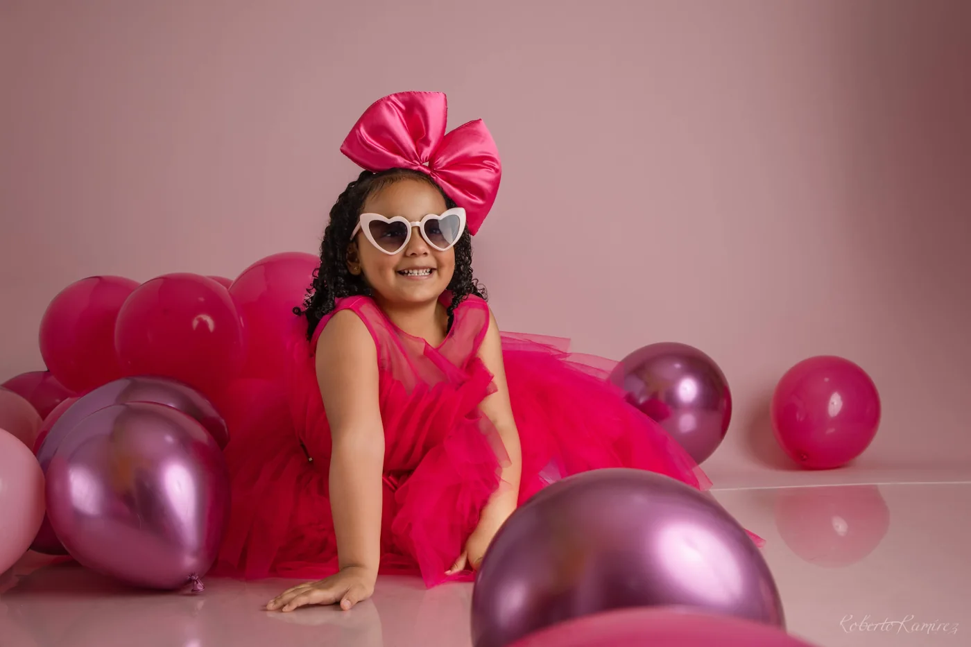 Retrato de cumpleaños con globos rosas